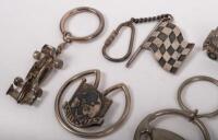 KEY CHAINS: A mixed group&nbsp;of items including keychains, a Tattersals Clash of the Titans 1997, a 1999 AGP, a pair of miniature Jaguar E-Types, Steering wheels and others - 3