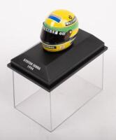 AYRTON SENNA: A 1:8 scale Minichamps 1994 Ayrton Senna helmet within perspex case