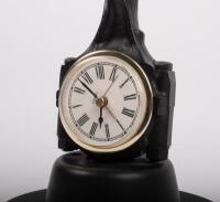 CLOCK / THERMOMETER: A desk analog clock and thermometer fixed to an item resembling a conrod & piston, 27cm high, untested - 2