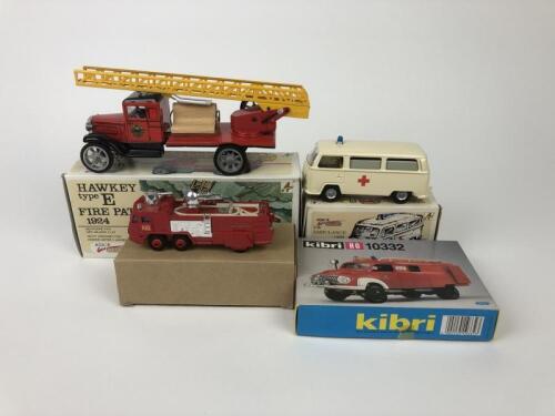 EMERGENCY VEHICLES: A group of scale model emergency vehicles