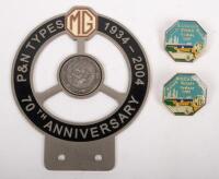 MG: Three MG related items including a MG 'P&N Types 1934-2004' 70th Anniversary grille badge and two small MG Car Club of Victoria National Meeting pins Geelong 2009.