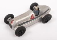 MERCEDES BENZ RACING CAR: A Dinky Toys Race Car Number 4, a silver Mercedes Benz W25 race car. Dinky Toys, made in England, Meccano Ltd.