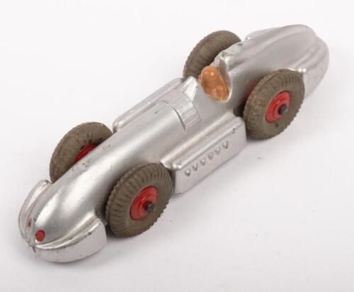 DINKY TOYS: An early Dinky Toys No.23E Speed of the Wind racer in silver with seated driver, made in England by Meccano