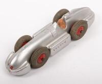 DINKY TOYS: An early Dinky Toys No.23E Speed of the Wind racer in silver with seated driver, made in England by Meccano