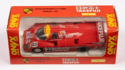 PORSCHE 962-C: A 1:43 scale 1988 Porsche 962-C , in original box, manufactured by Onyx Model Cars, made in Portugal