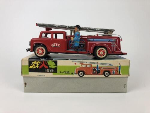 FIRE TRUCK TIN TOY: A Tin Toy Friction Fire Truck. Boxed