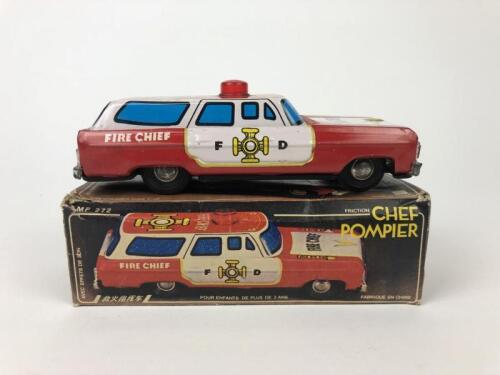 FIRE CHIEF CAR: A Fire Chief Car Tin Toy. Friction Powered