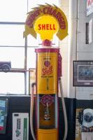 SHELL: A superbly restored 1920s manual petrol pump in 'Shell Motor Spirit' livery complete with&nbsp;plastic illuminated&nbsp;'Clamshell' globe surrounded by enamelled 'Super-CHARGED' wreath&nbsp;sign. - 5