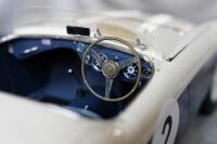 AUSTIN-HEALEY: A large exceptional (likely 1:10 scale) finely detailed model of a 1955 Austin-Healy 100S chassis AHS3701, thought to be scratch built by John Shinton in the UK, together with a framed collage presented to David Jones in appreciation of sev - 10