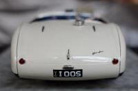 AUSTIN-HEALEY: A large exceptional (likely 1:10 scale) finely detailed model of a 1955 Austin-Healy 100S chassis AHS3701, thought to be scratch built by John Shinton in the UK, together with a framed collage presented to David Jones in appreciation of sev - 11