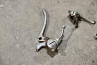 LEVERS: A group of advance and retard levers [Location: Sydney] - 2