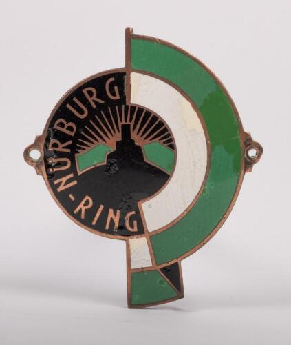 NURBURGRING/GERMANY: A rare pre-war German Nurburgring brass and enamel grill badge, with repairs to enamel, 9.5cm high