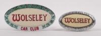 WOLSELEY: A pair of Wolseley badges, a Wolseley car club grille badge 5.5cm x 10.5cm, plus a Wolseley car badge, 4.5cm x 7.5cm