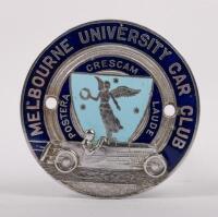 UNIVERSITY: A Melbourne university car club grille badge, an early example c1950's, manufactured by Stokes Melbourne, 7 cm in diameter