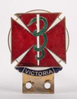 MEDICAL: A Victorian Doctors car grille badge, this enamel badge features the Rod of Asclepiuson across patt&eacute;e, has property of the medical society of Victoria and the number 1685 stamped on the rear, manufactured by Stokes and sons Melbourne, 6cm x 8cm