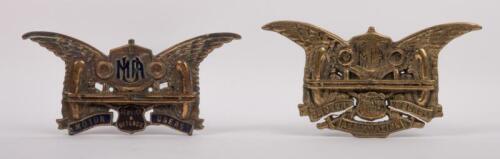 MUA: A pair of motor users association car grille badges, first badge is extremely rare and original but missing the lower section containing the word "association", c1920s, 7.5cm x 16cm, second badge is a brass reproduction version, 8.5cm x 16cm