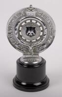 AA AUCKLAND: An R.A.C.A. with AA car grille badge, this is an AA Auckland version with the black enamel centre, has the number N5903 stamped on it, c1935 - 1948, 9.3cm diameter