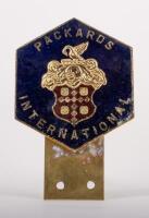PACKARDS: A brass Packards International grille badge