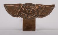 VINTAGE NZ CAR CLUB: A "Vintage NZ Car Club' winged grille badge