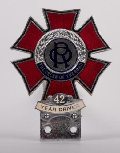 ORDER OF THE ROAD: A chrome enamel 'The Order of the Road' badge, 42 Year Driver award, engraved 'B5280' to reverse