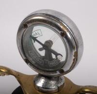 CAR MASCOT: A pre-war brass winged mascot with Calorimeter&nbsp;(temperature gauge) at centre, made by Wilmot of Birmingham, affixed to bakelite base - 2
