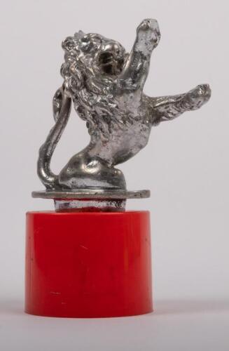 LION MASCOT: A likely pre-war 'rampant lion' car mascot, 10cm high, 11cm wide