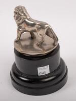 LION MASCOT: A pre-war car Lion mascot affixed to bakelite base, 7cm high (mascot only), 9cm long - 2