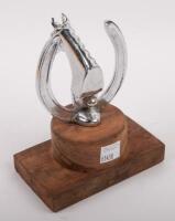 EQUESTRIAN: A chrome horse bust in horseshoe mascot affixed to wooden base, 8cm high (mascot only) - 2