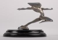 RUNNING INDIAN: A circa 1930s 'Running Indian' chrome hood ornament mascot, thought to possibly suit Alvis, comes with painted wooden base (not fixed), 12cm high (mascot only), 16.5cm long