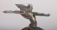 RUNNING INDIAN: A circa 1930s 'Running Indian' chrome hood ornament mascot, thought to possibly suit Alvis, comes with painted wooden base (not fixed), 12cm high (mascot only), 16.5cm long - 2