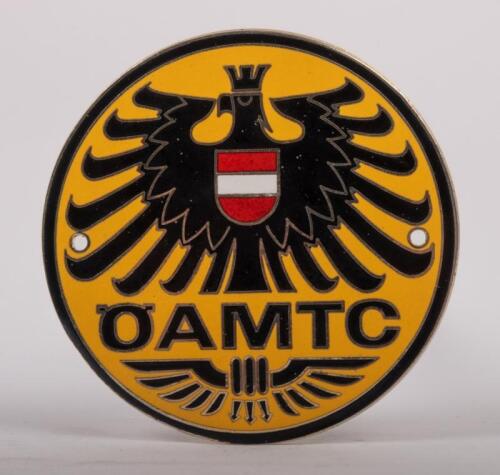 AUSTRIA: An enamel Austrian Automobile Motorcycle & Touring Club badge, 8cm in diameter