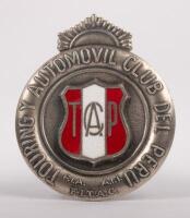 PERU: An enamel Touring and Automobil Club of Peru badge with rising sun finial, 7cm high, 6cm wide