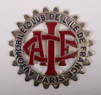 FRANCE:&nbsp;A nickel plated 'AUTOMOBILE-CLUB DE L'ILE DE FRANCE' membership badge, cog design&nbsp;with 'ACFI' emblem to centre, side mounts; 8.5cm in diameter.