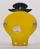 ZIMBABWE: A Zimbabwe Automobile Association badge with winged finial, yellow backplate, mounting brackets, 12.5cm high, 9.5cm wide - 2