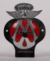MALAYSIA: A Malaysia Life Member Automobile Association badge, with winged finial, red backplate, mounting holes, 11cm high, 8.5cm wide