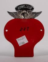 MALAYSIA: A Malaysia Life Member Automobile Association badge, with winged finial, red backplate, mounting holes, 11cm high, 8.5cm wide - 2