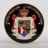 LIECHTENSTEIN: A Furstentum Liechtenstein (Principality of Liechtenstein) enamel badge with coat of arms to centre, mounting holes, 7cm in diameter