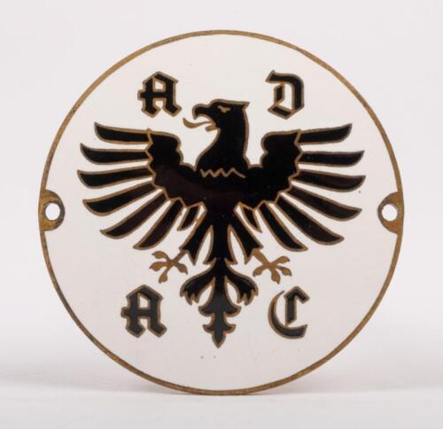 GERMANY: An A.D.A.C (Allgemeiner Deutscher Automobil Club) enamel badge, with mounting holes, 7cm in diameter