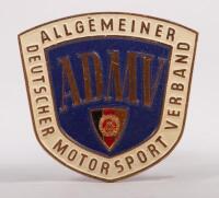 GERMANY: An A.D.M.V (General German Motorsport&nbsp;Association) badge, with East German shield to lower centre, mounting pins, 7cm high, 7.5cm wide