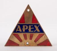 APEX: An Apex Australia triangular grille enamel grille badge, with mounting holes, 6.5cm high, 7.5cm wide