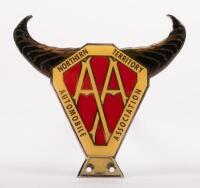 NORTHERN TERRITORY: A Northern Territory Automobile Association badge with horn finial, mounting holes, 12cm high, 12cm wide