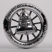 CALIFORNIA: A modern Southern California Automobile Club badge, wheel design with bell to centre, 9.5cm in diameter