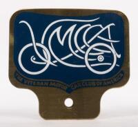 V.M.C.C.A: A Veteran Motor Car Club of America badge, with mounting hole, 9cm high, 10cm wide
