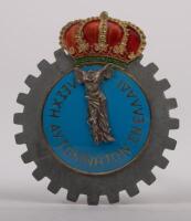 GREECE: An early Greek badge, cog design, Greek lettering, crown finial, with mounting pins, 10cm high, 8.5cm wide