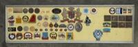 BADGE BOARD: A badge board containing approx 50 badges mostly related to Australian car club events, some fixed to board, some are loose
