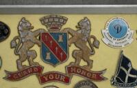 BADGE BOARD: A badge board containing approx 50 badges mostly related to Australian car club events, some fixed to board, some are loose - 7