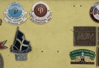 BADGE BOARD: A badge board containing approx 50 badges mostly related to Australian car club events, some fixed to board, some are loose - 9