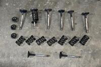 VALVE SPRINGS: A quantity of valve springs, collets and collet holders. [Location: Sydney]