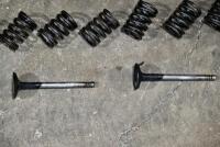 VALVE SPRINGS: A quantity of valve springs, collets and collet holders. [Location: Sydney] - 2