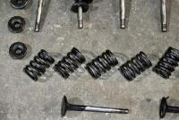 VALVE SPRINGS: A quantity of valve springs, collets and collet holders. [Location: Sydney] - 4